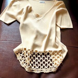 New top with crochet panel at bottom front & Center Front “V”. Unique.